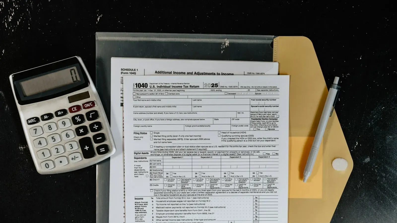 Calculator on US tax forms, illustrating getting an EIN without an SSN